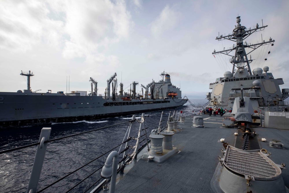 USS Ralph Johnson Conducts Replenishment-At-Sea with USNS Yukon.