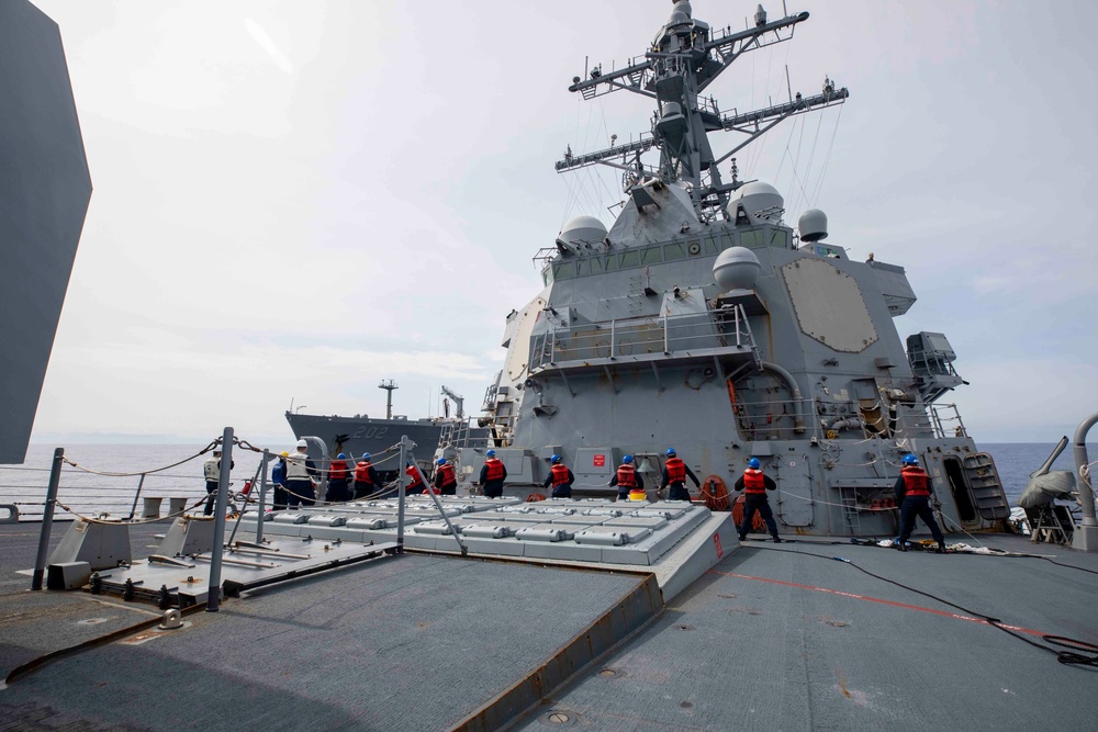 USS Ralph Johnson Conducts Replenishment-At-Sea with USNS Yukon.