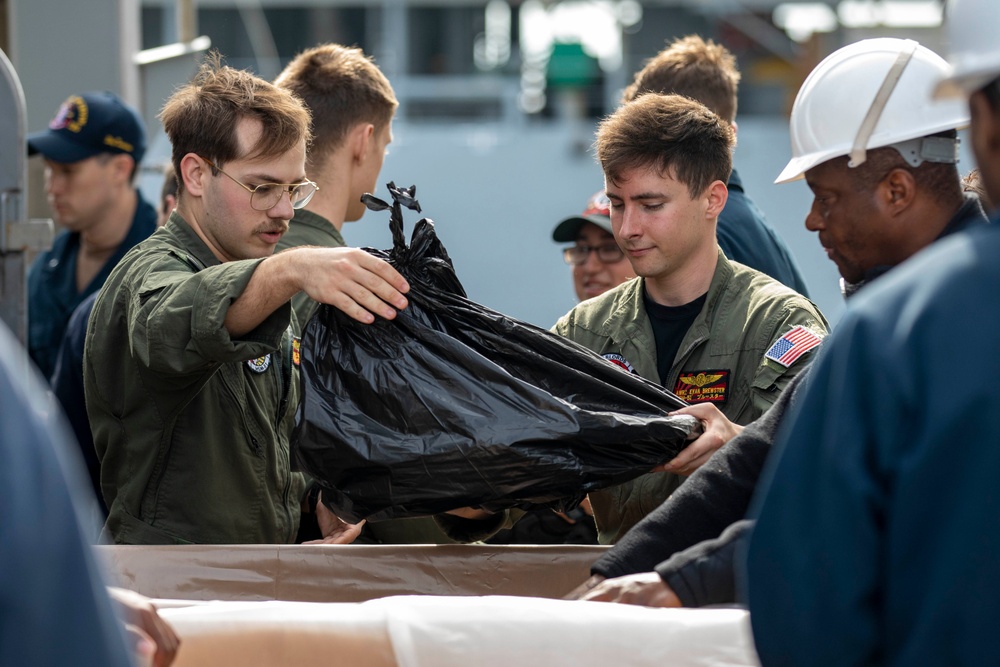 USS Ralph Johnson Conducts Replenishment-At-Sea with USNS Yukon.