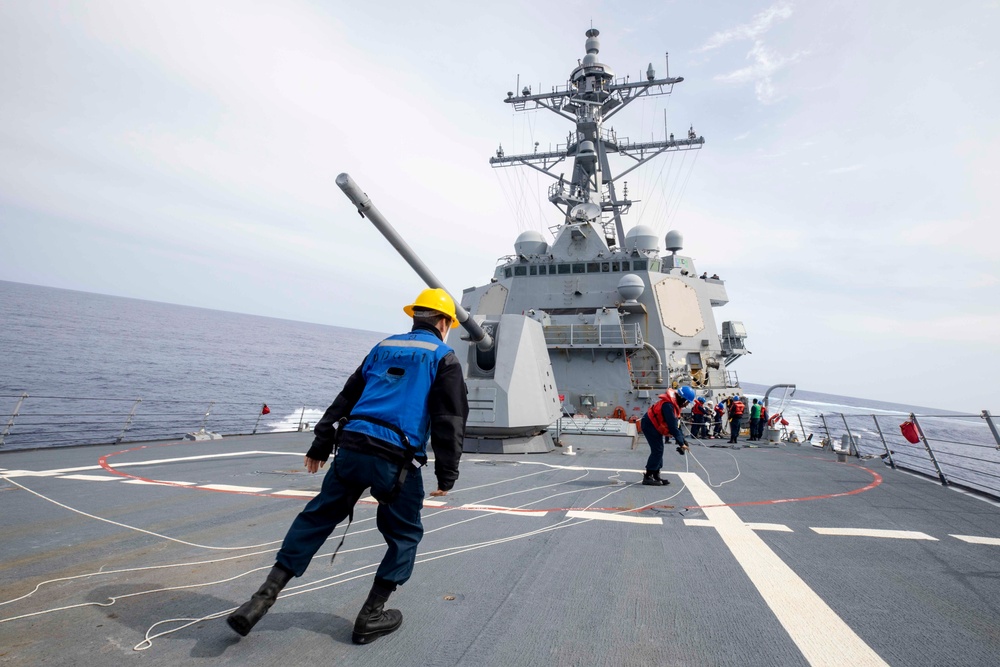 USS Ralph Johnson Conducts Replenishment-At-Sea with USNS Yukon.