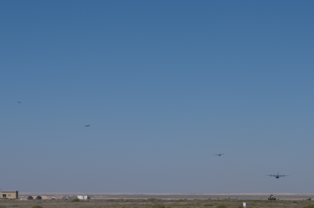 Airmen load AFCENT C-130s with humanitarian aid bound for Gaza