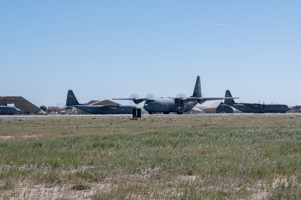 Airmen load AFCENT C-130s with humanitarian aid bound for Gaza