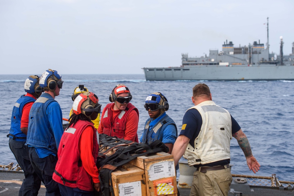 USS Mason Conducts A Replenishment at  Sea With USNS Supply in the Red Sea