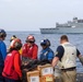 USS Mason Conducts A Replenishment at  Sea With USNS Supply in the Red Sea