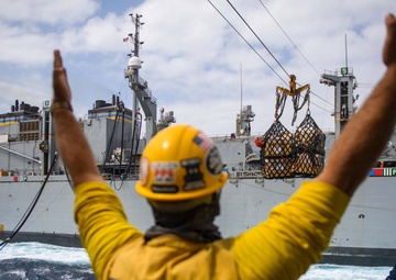 USS Mason Conducts A Replenishment at  Sea With USNS Supply in the Red Sea