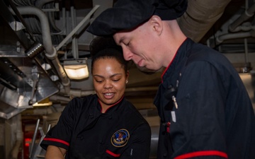 USS Carl Vinson (CVN 70) Sailors Prepare Food