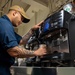 USS Carl Vinson (CVN 70) Sailor Prepares Coffee