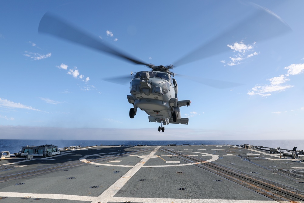 Sailors aboard the USS Howard conduct flight quarters in the Philippine Sea