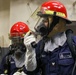 Sailors aboard the USS Howard conduct damage control training team drills in the Philippine Sea