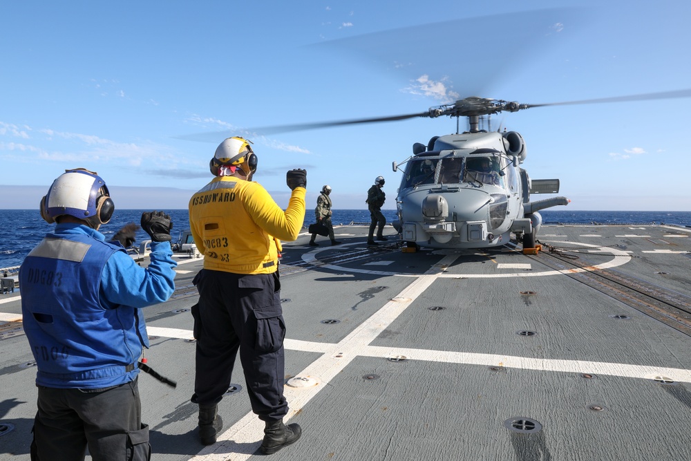 Sailors aboard the USS Howard conduct flight quarters in the Philippine Sea
