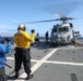 Sailors aboard the USS Howard conduct flight quarters in the Philippine Sea