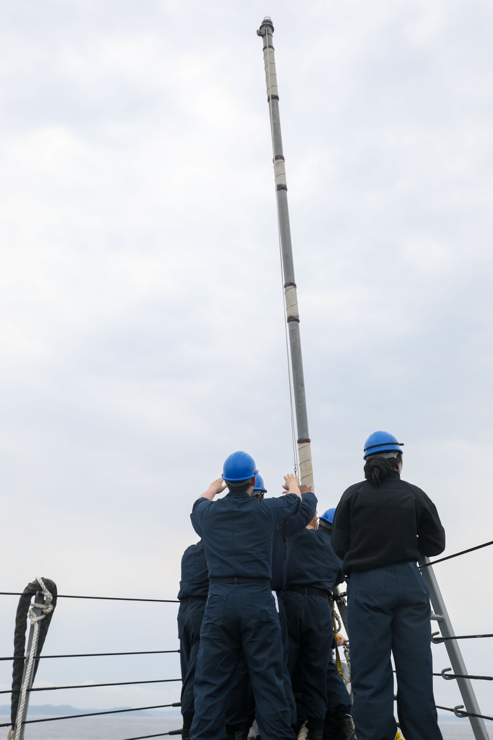 Sailors aboard the USS Howard conduct a sea and anchor detail in Okinawa, Japan