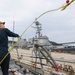 Sailors aboard the USS Howard conduct a sea and anchor detail in Okinawa, Japan