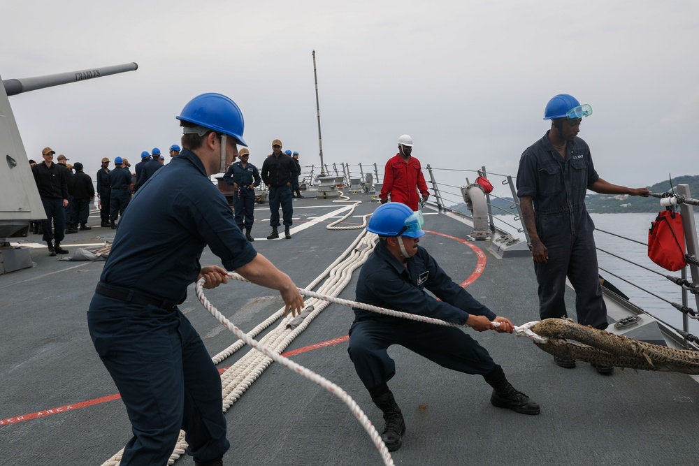 Sailors aboard the USS Howard conduct a sea and anchor detail in Okinawa, Japan