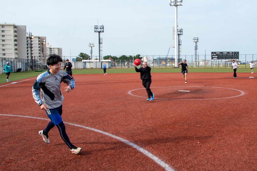 USS Ronald Reagan (CVN 76) Sailors participate in a kick ball tournament with members of the JMSDF JS Izumo (DDH 183)