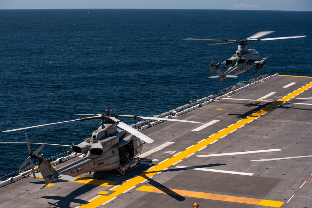 VMM-165 (Rein.) H-1s Land Aboard USS Boxer