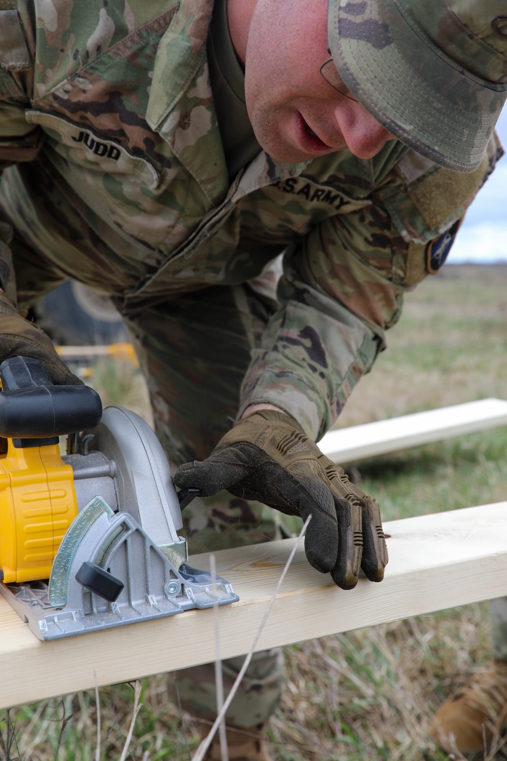 Engineers build and maintain trenches in training area