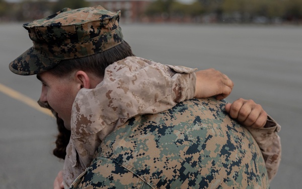 Pvt Analise Yacone receives eagle, globe and anchor