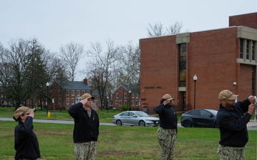 Fleet Cyber Command Sailors execute evening colors