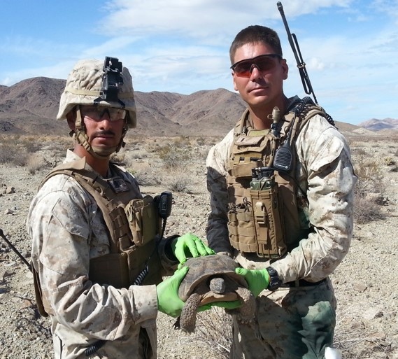 Earth Day; U.S. Marines pose for a photo with a desert tortoise