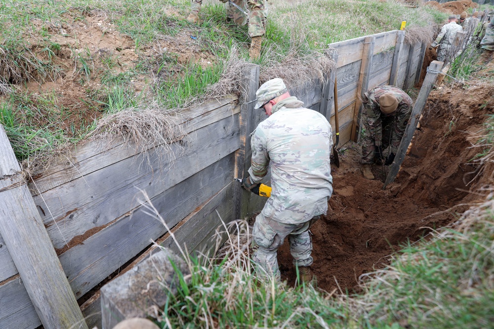 Engineers repair and replace trenches in training area