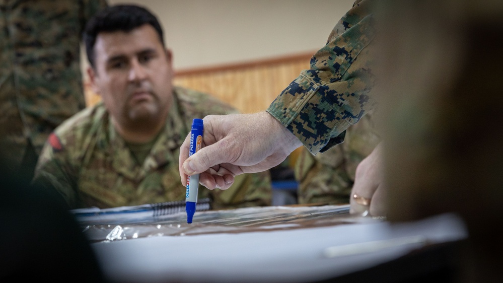 U.S. Marines with 25th Marine Regiment conduct an Amphibious Intelligence SMEE with Chilean Marines