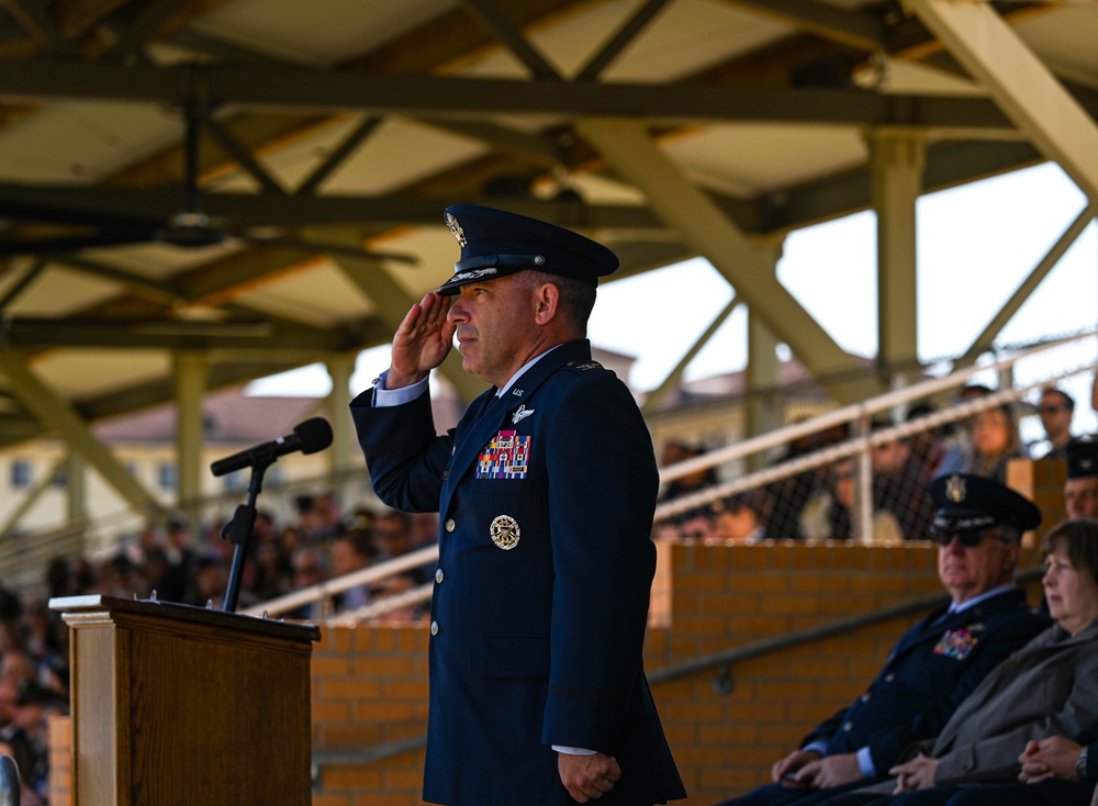 Crow 01 presides over OTS graduation, commissions first wing graduate