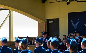 Crow 01 presides over OTS graduation, commissions first wing graduate