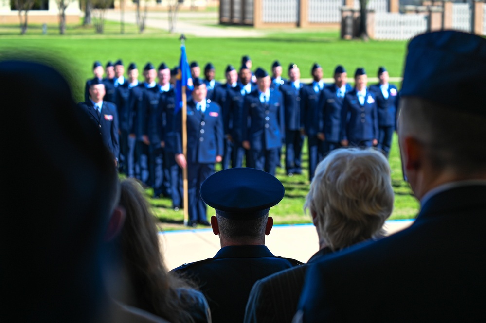 Crow 01 presides over OTS graduation, commissions first wing graduate