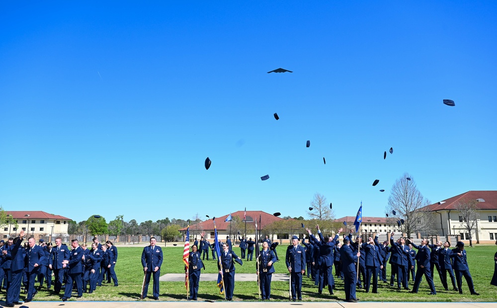 Crow 01 presides over OTS graduation, commissions first wing graduate