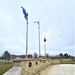 Raising flag at Fort McCoy's Veterans Memorial Plaza
