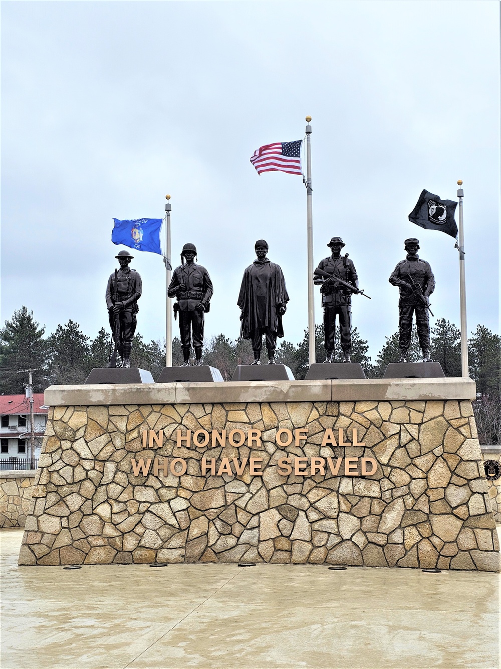 Raising flag at Fort McCoy's Veterans Memorial Plaza