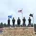 Raising flag at Fort McCoy's Veterans Memorial Plaza