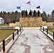 Raising flag at Fort McCoy's Veterans Memorial Plaza
