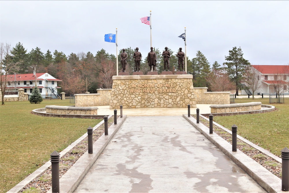 Raising flag at Fort McCoy's Veterans Memorial Plaza