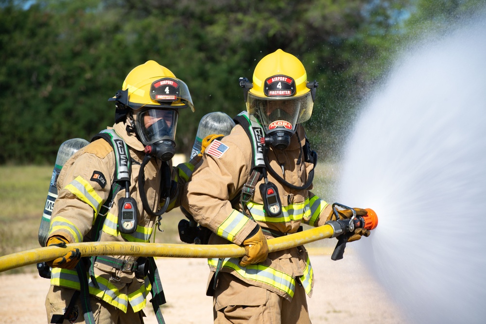 PMRF Fire and Emergency Services Department Conducts Live Fire Training With Lihue Airport Fire Department.