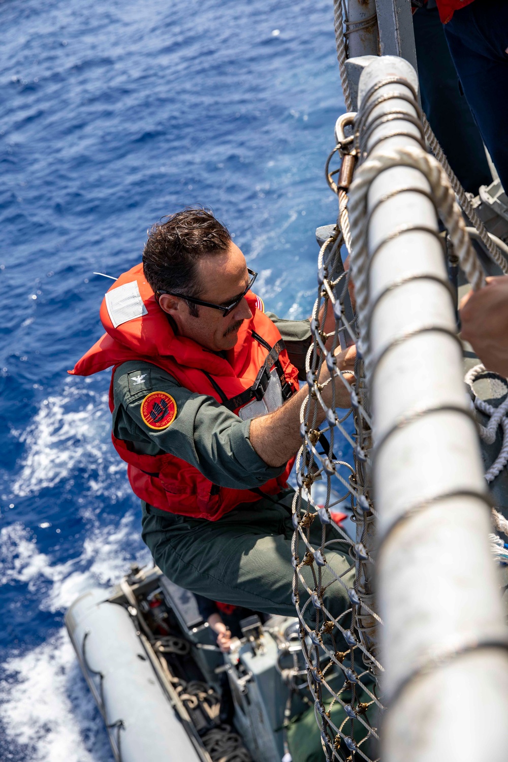 USS Ralph Johnson Conducts Personnel Transfer