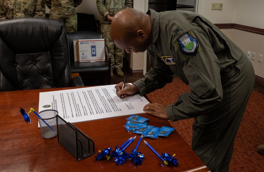 Travis leaders sign April procamation