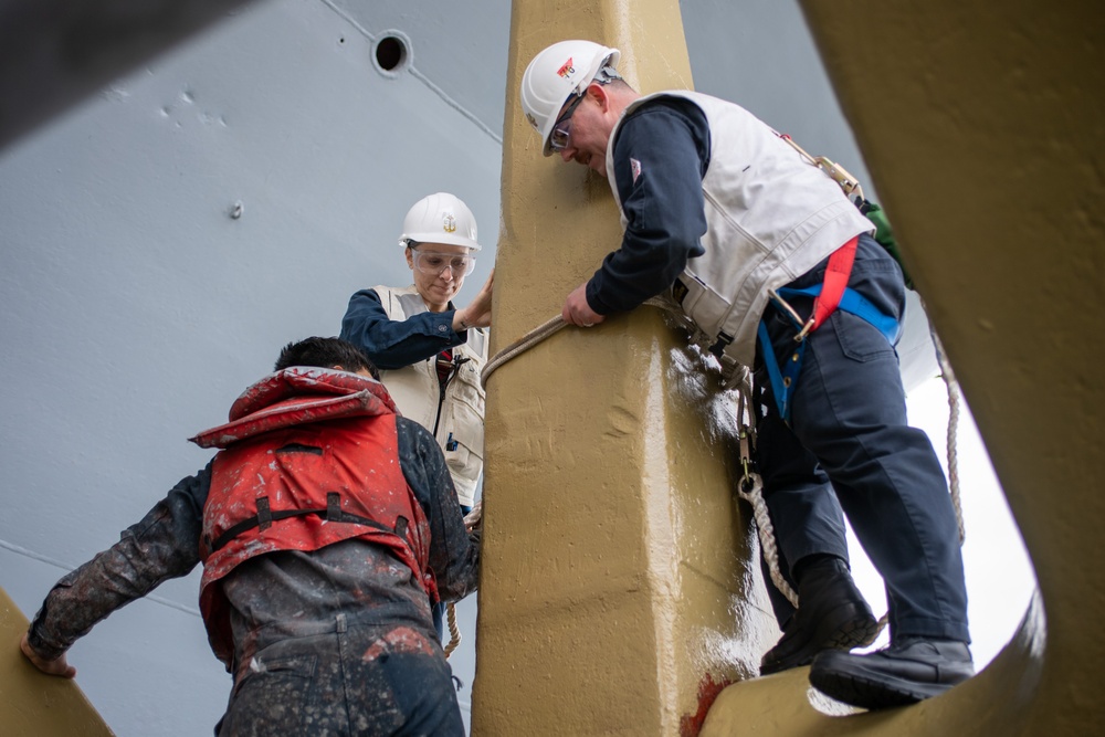 USS Ronald Reagan (CVN 76) Sailor re-enlists on the anchor