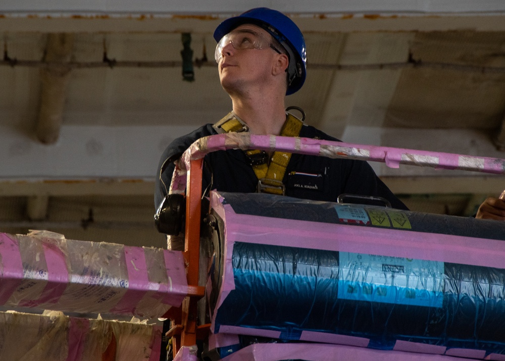 USS Ronald Reagan (CVN 76) Sailors conduct daily maintenance