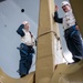 USS Ronald Reagan (CVN 76) Sailor re-enlists on the anchor