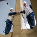 USS Ronald Reagan (CVN 76) Sailor re-enlists on the anchor