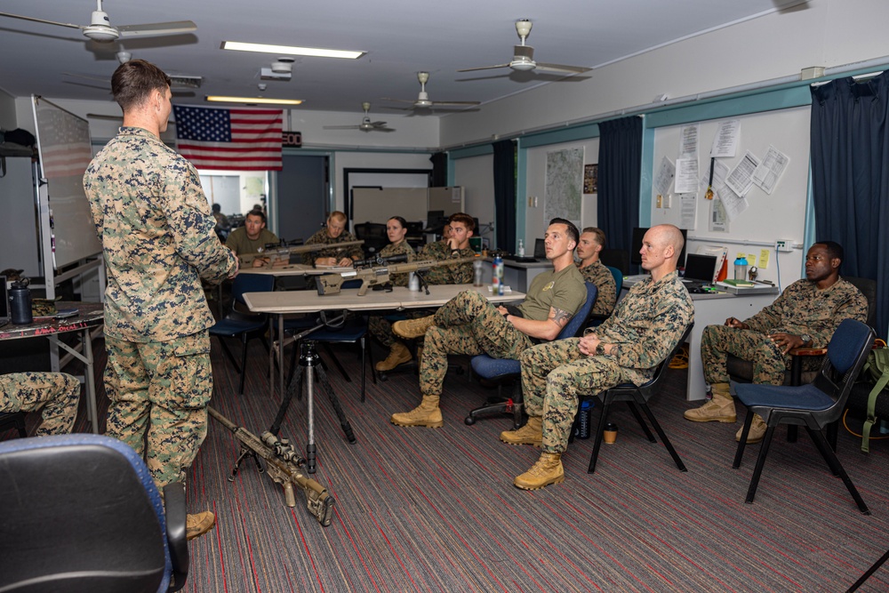 Marines with 2nd Bn., 5th Marines teach EOD technicians about M110 SASS