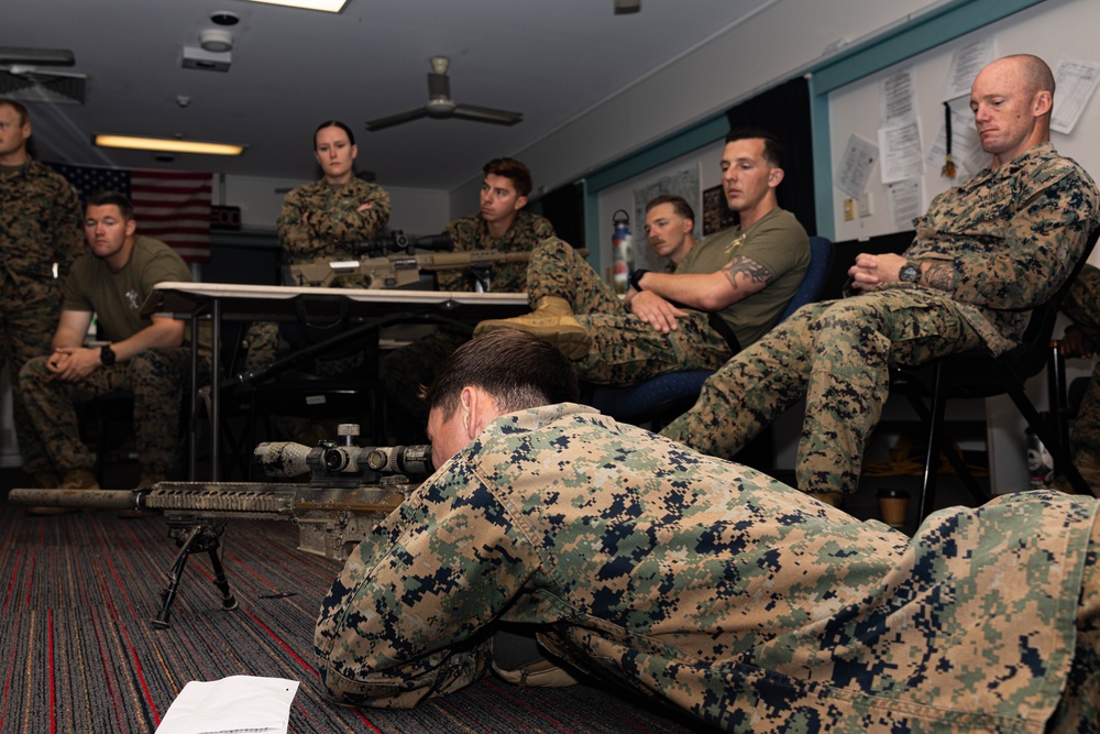 Marines with 2nd Bn., 5th Marines teach EOD technicians about M110 SASS