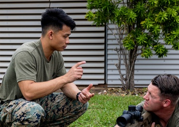 Marines with 2nd Bn., 5th Marines teach EOD technicians about M110 SASS