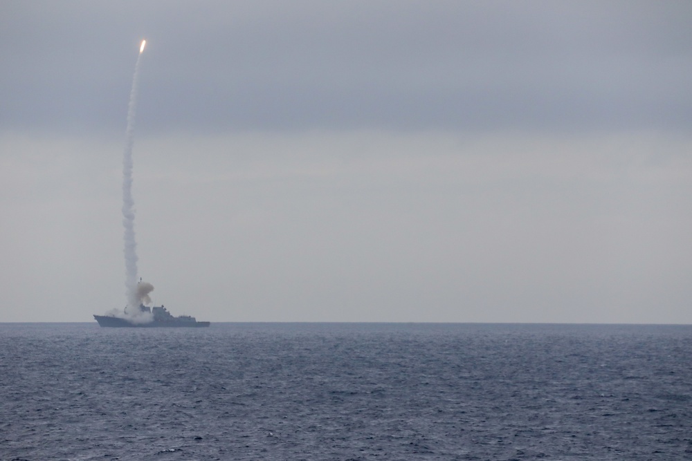 Sailors aboard the USS Ralph Johnson conduct a live-fire exercise in the Philippine Sea