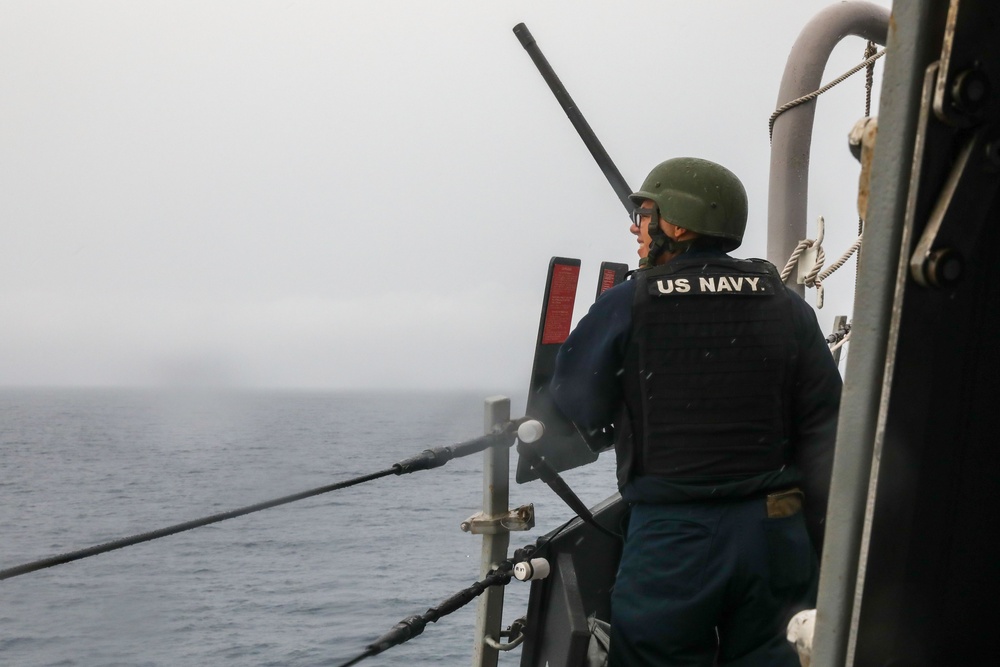 Sailors aboard the USS Howard conduct a sea and anchor detail in Okinawa, Japan