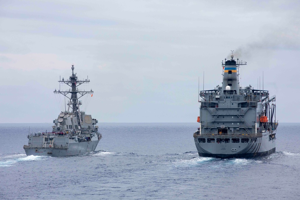 USS Ralph Johnson and USS Howard Conduct Replenishment-at-Sea