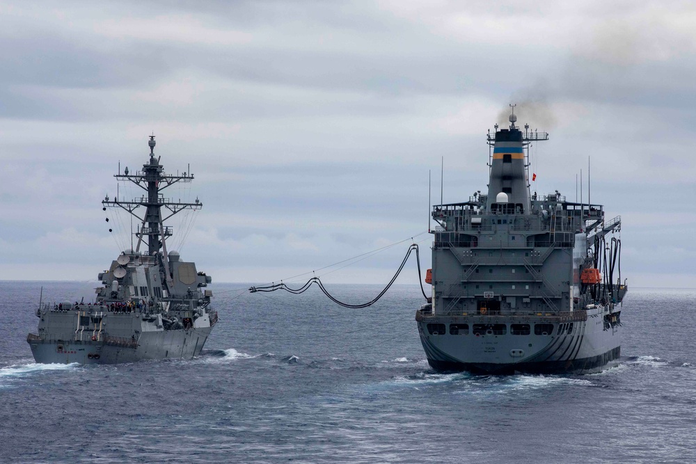 USS Ralph Johnson and USS Howard Conduct Replenishment-at-Sea