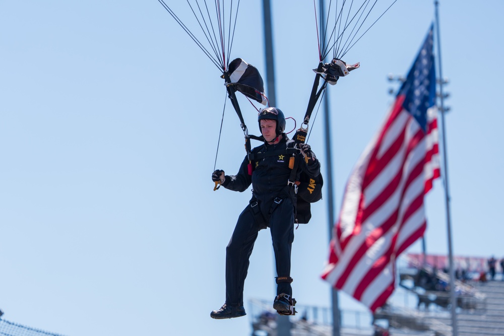 Soldiers from Army Golden Knights jump into Martinsville Motor Speedway ahead of the NASCAR race